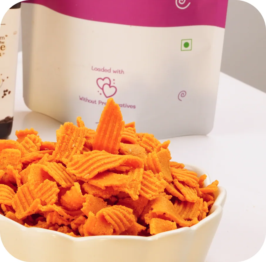 A bowl of savoury ribbon mixture in front of an Oorla retail pouch